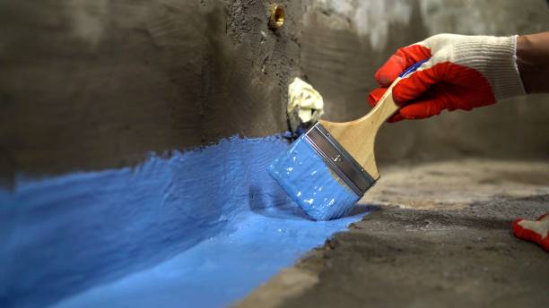 SJ Waterproofing Pros commercial waterproofing team near Uniontown, AL